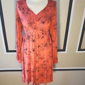 Chic coral dress with a hippie vibe